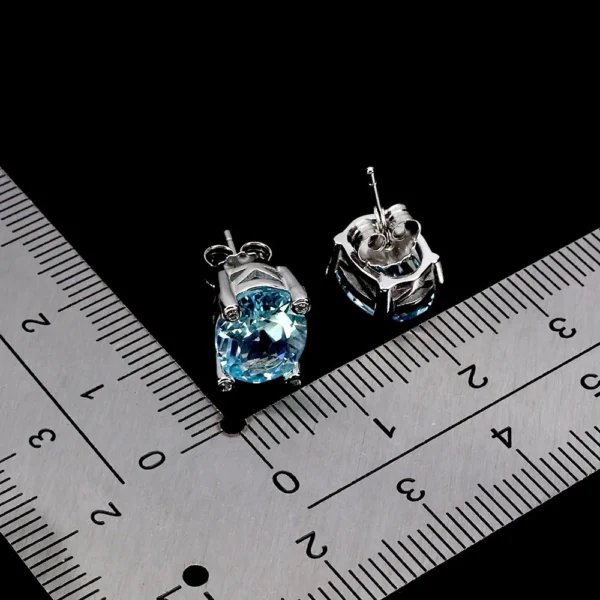 Ezüst fülbevaló topázzal, 10*8 mm, égszínkék, beszúrós kivitel - Image 2